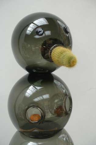 Klaus WeberSnowwoman&nbsp;(DETAIL), 2015-16Mouthblown glass, living and growing cactus, dried tangerines&nbsp;34 1/4 x 15 3/8 x 13 in (87 x 39 x 33 cm)&nbsp;