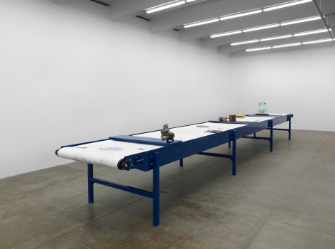 Goshka MacugaBefore the Beginning and After the End: Artists&rsquo; Systems (in collaboration with Patrick Tresset), 2016&nbsp;Blue table with vitrines, biro drawings by system &ldquo;Paul-n&rdquo; on paper scrolls, artworks&nbsp;and&nbsp;objects&nbsp;Dimensions variable